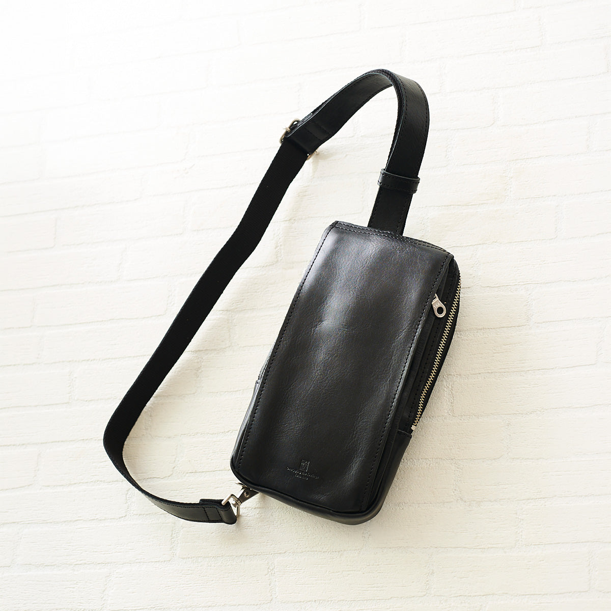 SLANTING -Slanting- Vertical Sling Bag S KOT1007