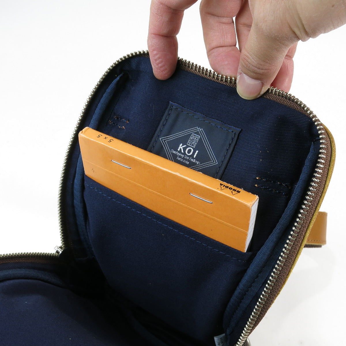 SLANTING -Slanting- Vertical Sling Bag S KOT1007